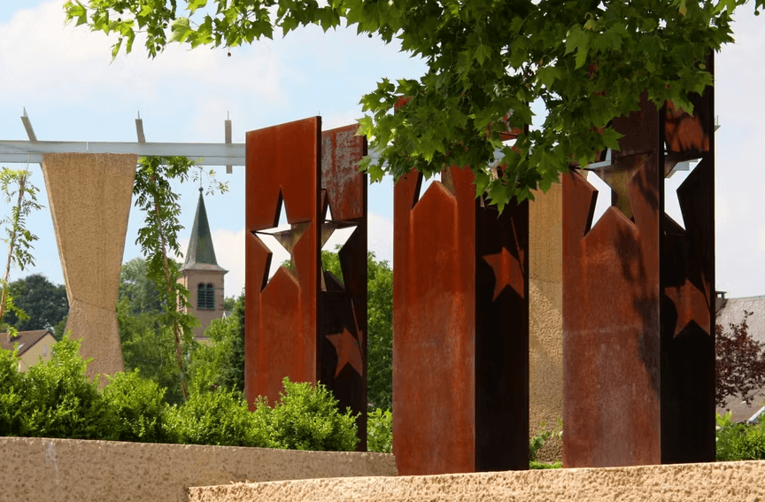 Monument to the Schengen Agreement with star-shaped cutouts in Schengen, Luxembourg